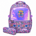 A pink and purple patterned backpack with a holographic front pocket and a matching pencil case, both featuring a colorful retro-style print with a butterfly motif and the Smiggle logo.