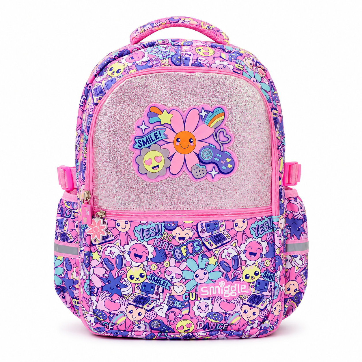 A pink and purple backpack with a glittery pink front pocket featuring a smiling flower patch and a busy cartoon print on the sides and bottom, photographed on a white background.